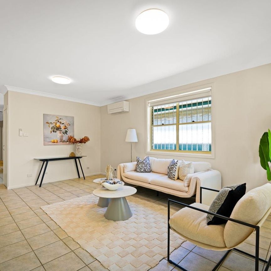 STYLISH BRICK HOME WITH SPACE, COMFORT & LOCATION - Photo 1