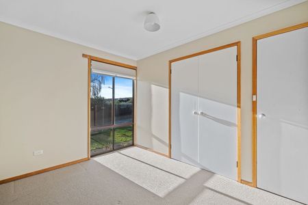 Warm & inviting Your Own Slice of Quiet — Fenced, Spacious & Perfectly Located - Photo 5