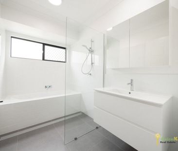 BRAND NEW, Sleek and Stylish In Central Location! - Photo 5