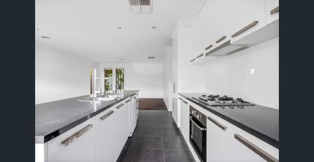 Designed with practicality in mind, this neat three-bedroom home offers a family-friendly layout that is situated in the ever-growing suburb of Lucas. - Photo 2