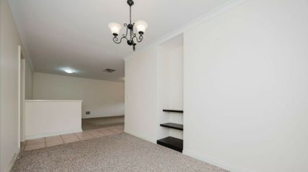 SPACIOUS FAMILY LIVING WITH MULTIPLE LIVING AREAS - Photo 4