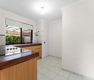 Practical Living with a Spacious Courtyard! - Photo 4