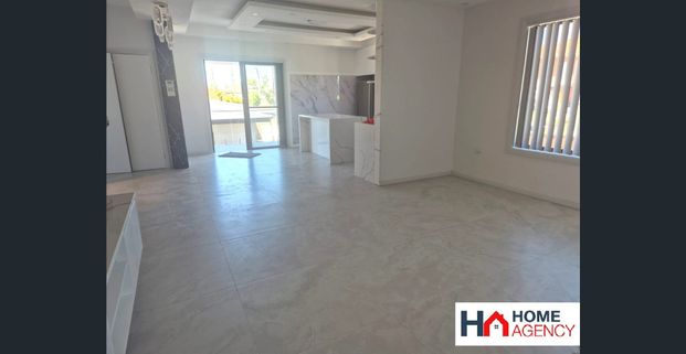FULLY RENOVATED 4 BEDROOM HALF HOUSE (Top Level) - Photo 1