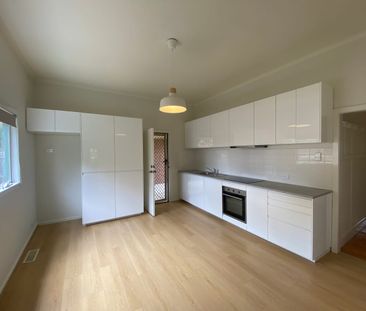 Low maintenance living in ideal location - Photo 1