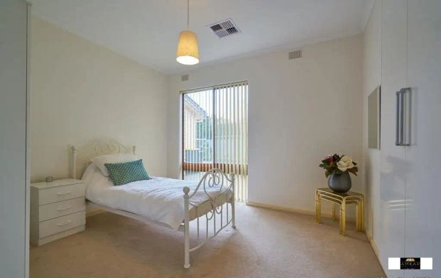 “Welcome to this spacious and secure courtyard homette near the CBD located at the rear of a small group of four.” - Photo 1