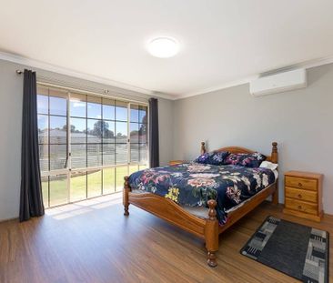 Beautifully renovated 4-bedroom, 2-bathroom family home - Photo 4
