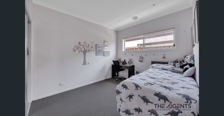 Perfect Family Home with Multiple Living Areas & Modern Comforts - Photo 3