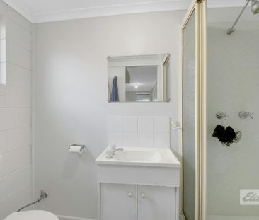 THIS PROPERTY OFFERS LOW MAINTENANCE LIVING WITH A SPACIOUS YARD , ... - Photo 1