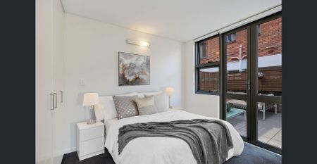 Modern 1 Bedroom Apt with Secure Parking in Great Location - Photo 2