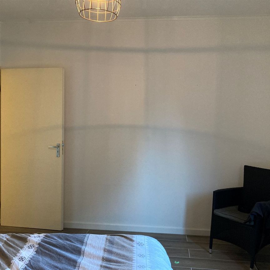 Gelijkvloers appartement met 1 slaapkamer en garage - Foto 1