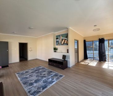 Freshly Updated 3-Bedroom Home with New Landscaping & Semi Furnishe... - Photo 6