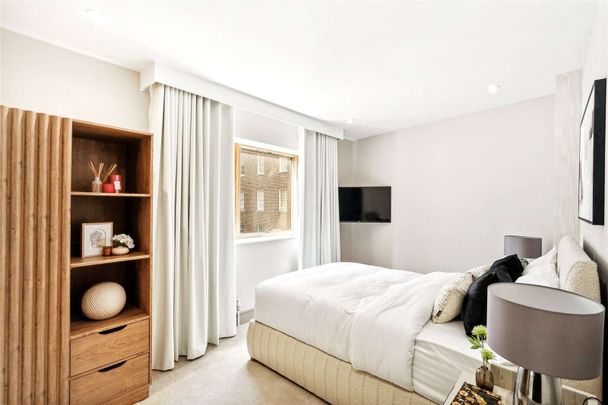 A beautifully presented 3 bedroom apartment on the third floor of this portered and well managed block in central London. - Photo 1