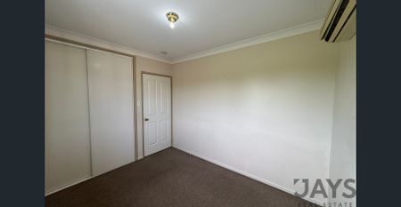 Lovely 3-Bedroom Townhouse with Great Amenities - Photo 3