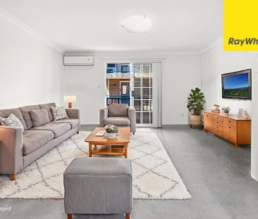 TWO BEDROOM APARTMENT WITH LOCK-UP GARAGE IN CONVENIENT LOCATION - Photo 1