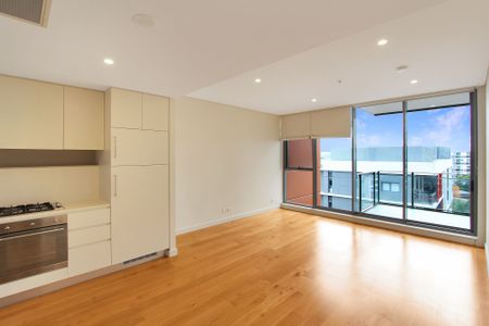 North Facing Bedroom with New Appliances and Floorboards! - Photo 2
