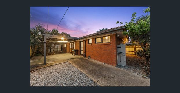 Comfortable Family Home with Spacious Outdoor Entertaining! - Photo 1