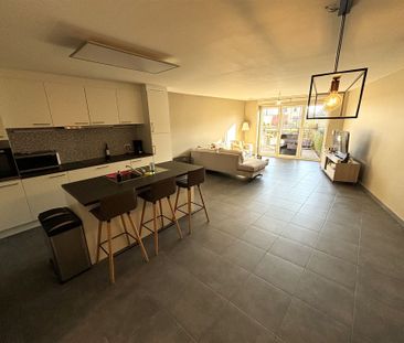 Gelijkvloers appartement met 2 slaapkamers en terras. - Photo 2