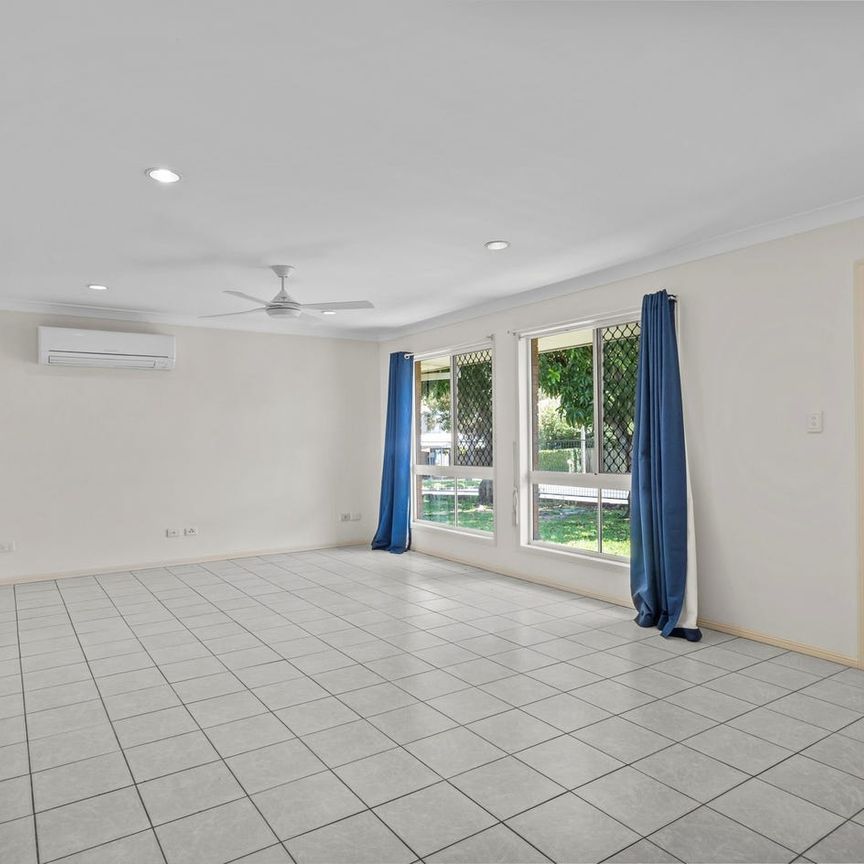 Fresh, Spacious and Family Friendly Living in a Super Convenient Location - Photo 1