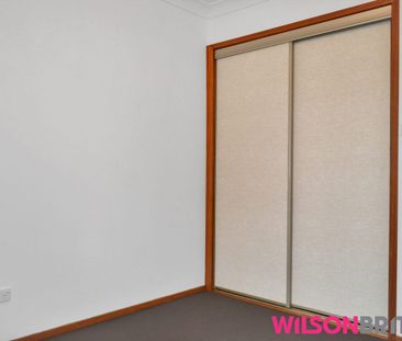 Solid Three Bedroom Family Home with Big Backyard on 815sqm - Photo 1