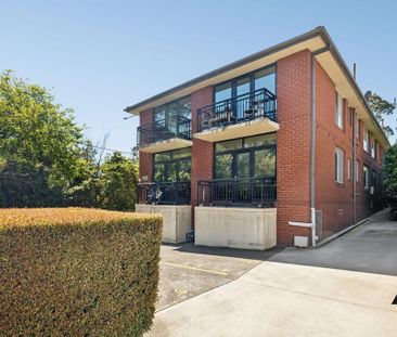 Leafy Top-Floor Haven with Dual Balconies and Modern Comfort - Photo 6