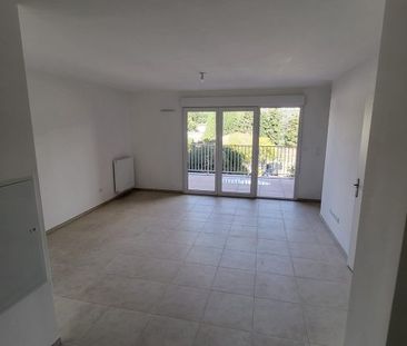 T3 AVEC LOGGIA + PARKINGS - Photo 2