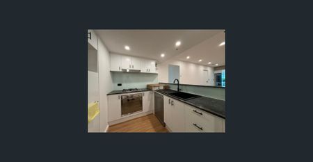 Contemporary Renovated modern Two Bedroom + Study Apartment - Photo 4