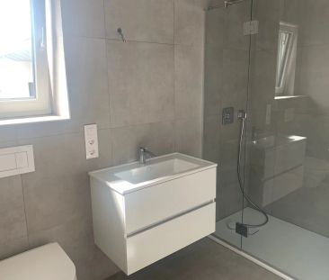 Erstbezug: Traumhafte Maisonette mit großzügigem, überdachtem Balkon - Photo 6