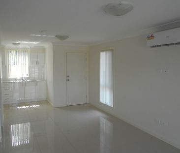 Three Bedroom Townhouse In Convenient Location - Photo 2