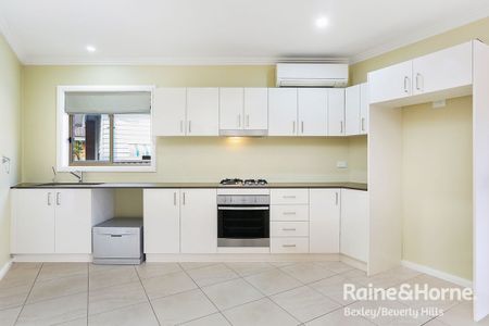 Modern two-bedroom home (6 MONTH LEASE ONLY) - Photo 2