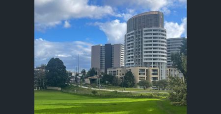 "Near New Two Bedroom Apartment with Timber Floors." - Photo 2