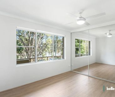 Spacious 2-Bedroom Unit with Park Views – Prime Location! - Photo 1