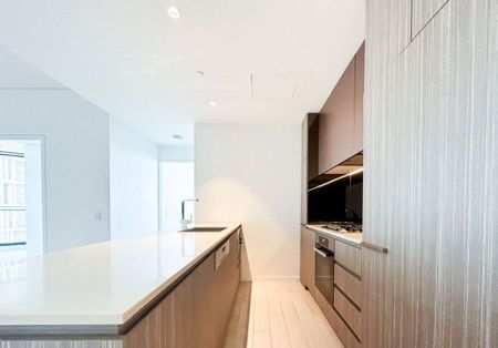 Executive Living: Furnished 2 Bedroom + Study Apartment at Infinity for Lease! - Photo 4