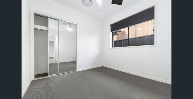 Modern Family Home with Spacious Study | Prime North Kellyville Location - Photo 1