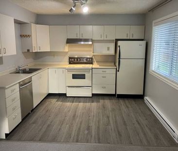 Bright, Clean, Spacious Full Height Suite in Great Location - Photo 1