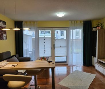 Möbliert & rollstuhlgerecht: moderne EG-Wohnung mit Terrasse & Gart... - Foto 1