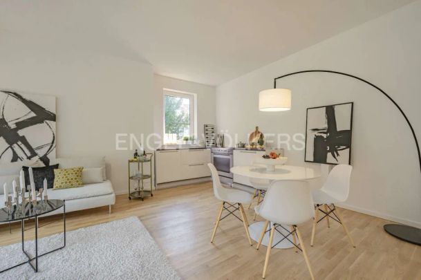 Energieeffizient und mit Liebe zum Detail - Maisonette-Wohnung mit eigenem Garten - Foto 1