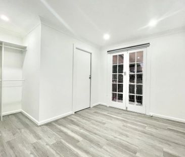 Stylish Low-Maintenance Home with Spacious Terrace - Photo 6