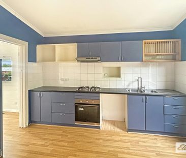 THREE BEDROOM CLOSE TO SCHOOLS AND DAYCARE - Photo 5