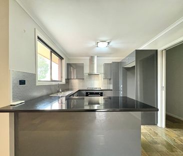 Stylish 3-Bedroom Home with Outdoor Entertaining & Spacious Yard - Photo 6