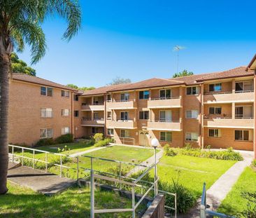 Neat and Tidy two-bedroom unit with parking - Photo 3