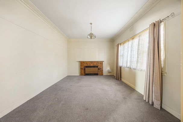 EXCELLENT HOME IN GREAT LOCATION WITH LARGE YARD - Photo 1