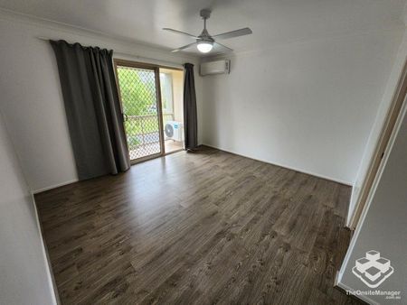 Double Garage, Air-Conditioned and wooden flooring throughout! - Photo 3