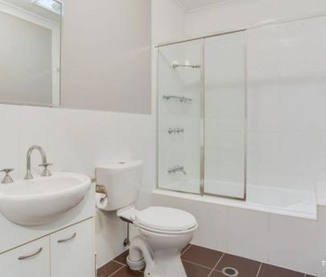 TOWNHOUSE IN BEAUTIFUL GATED COMPLEX - Photo 1