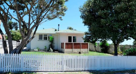 Elevated Three-Bedroom Home with Coastal Outlook - Photo 5