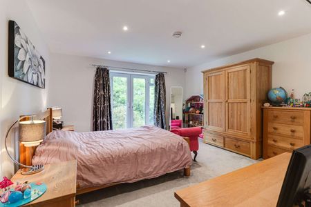 Five bedroom family home with driveway parking and lovely garden in a prime village setting. - Photo 3