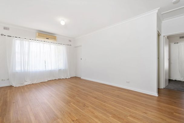 Refurbished unit in peaceful, well-connected suburb - Photo 1