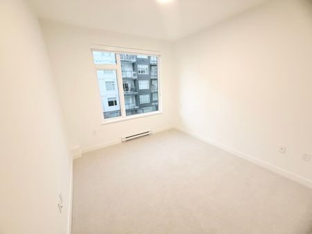 One Bedroom and Den with Parking and Storage in Convenient Surrey Central - Photo 2