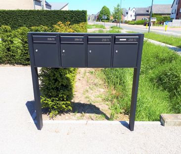 2 slaapkamerappartement met terras en 2 autostaanplaatsen - Photo 4