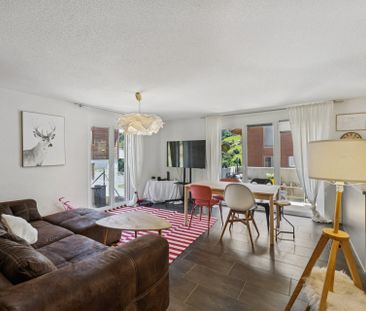 Sunny 2-Bedroom Haven with Terrace & Fireplace - Photo 1