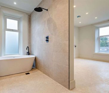 Elegant apartment is situated within a beautifully renovated period... - Photo 6